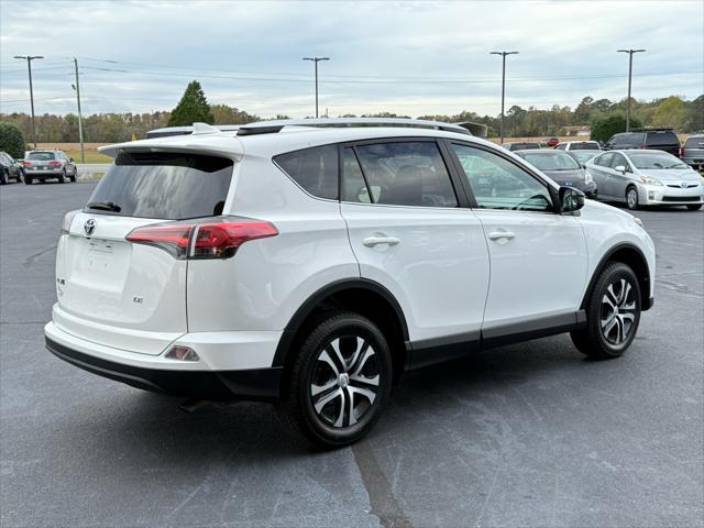 used 2016 Toyota RAV4 car, priced at $13,999