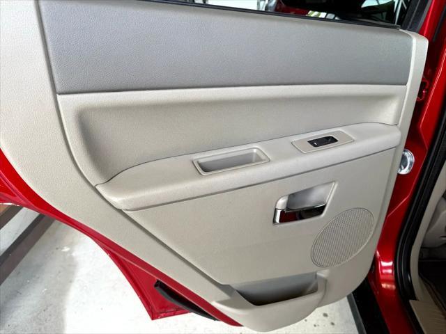 used 2010 Jeep Grand Cherokee car, priced at $10,999