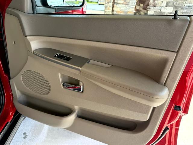 used 2010 Jeep Grand Cherokee car, priced at $10,999