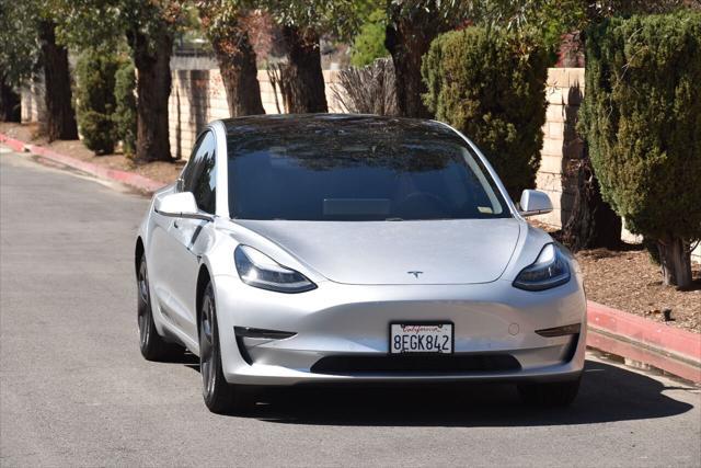 used 2018 Tesla Model 3 car, priced at $19,999