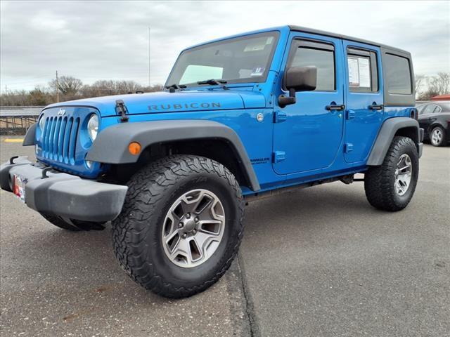 used 2015 Jeep Wrangler Unlimited car, priced at $23,800