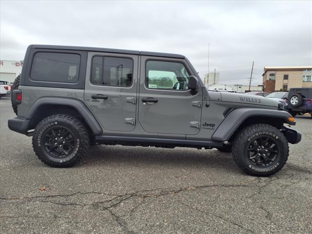 used 2021 Jeep Wrangler Unlimited car, priced at $34,625