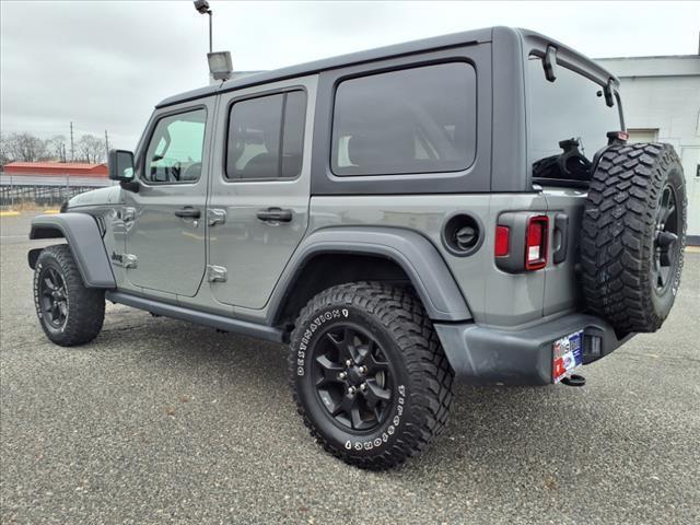 used 2021 Jeep Wrangler Unlimited car, priced at $34,625