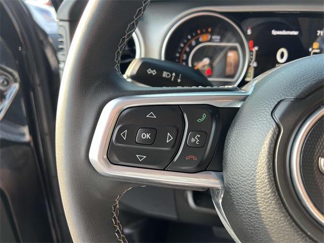 used 2023 Jeep Wrangler car, priced at $33,857