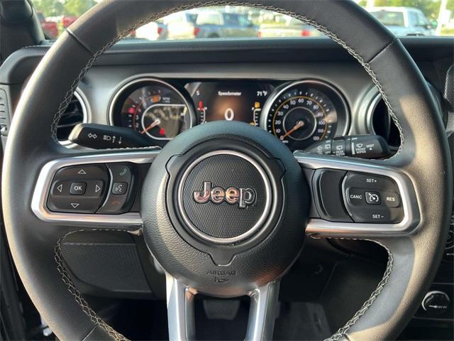 used 2023 Jeep Wrangler car, priced at $33,857