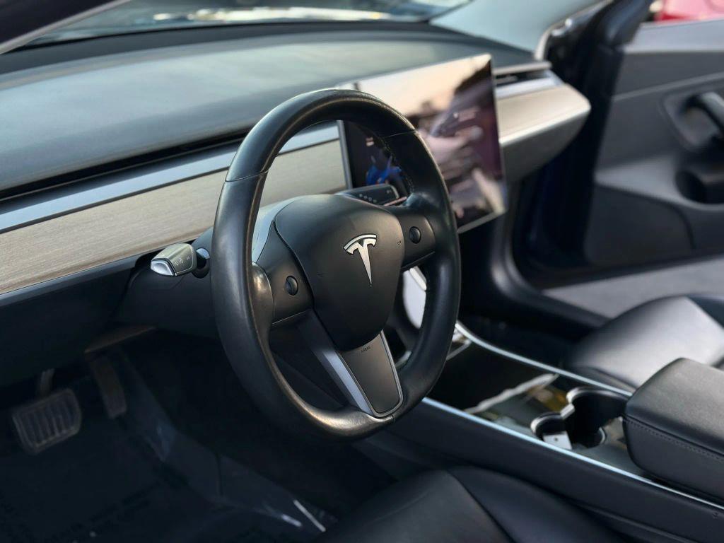 used 2018 Tesla Model 3 car, priced at $16,499