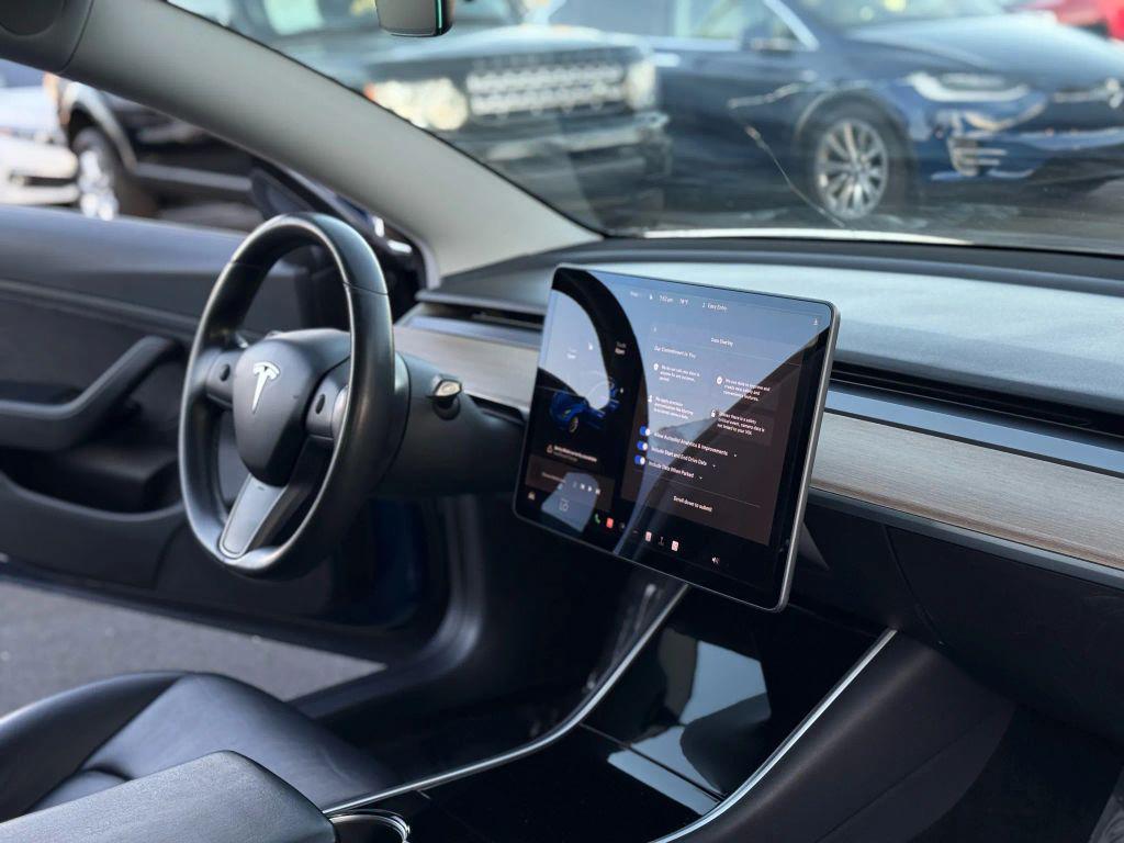 used 2018 Tesla Model 3 car, priced at $16,499
