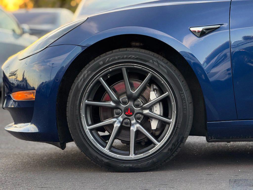 used 2019 Tesla Model 3 car, priced at $14,999