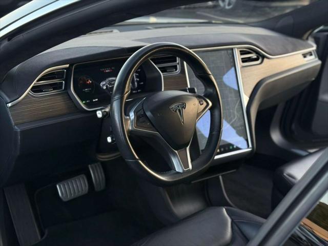 used 2014 Tesla Model S car, priced at $9,999