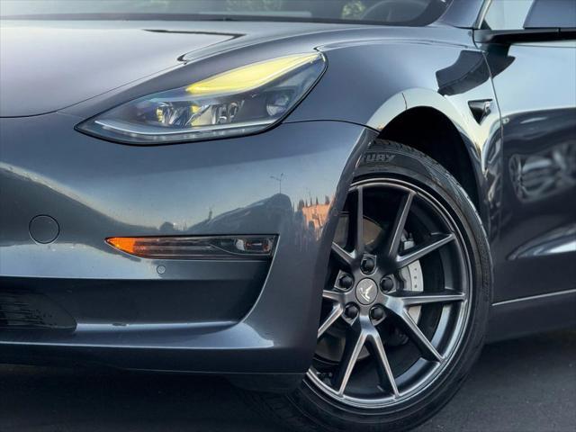 used 2022 Tesla Model 3 car, priced at $19,499