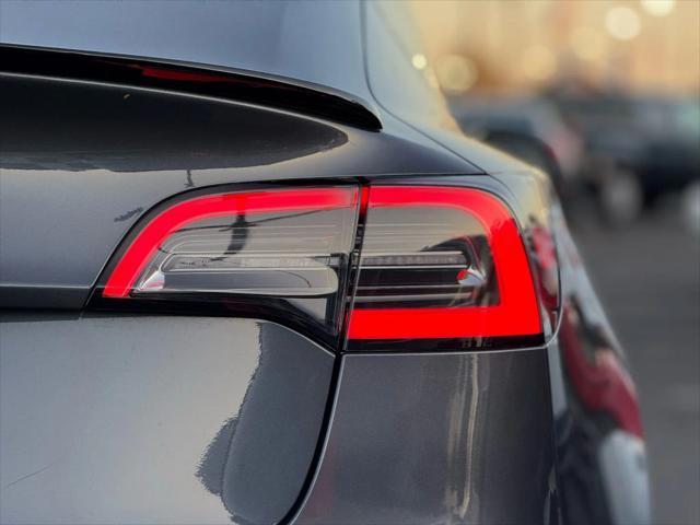 used 2022 Tesla Model 3 car, priced at $19,499