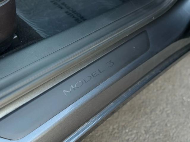 used 2022 Tesla Model 3 car, priced at $19,499