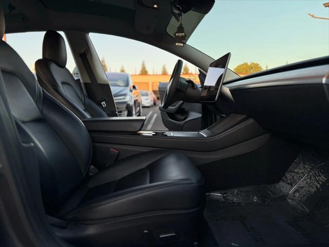 used 2022 Tesla Model 3 car, priced at $19,499