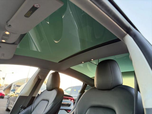 used 2022 Tesla Model 3 car, priced at $19,499