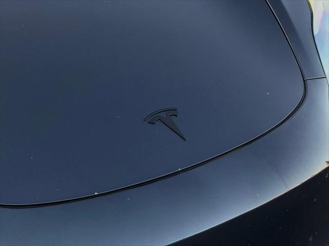used 2022 Tesla Model 3 car, priced at $19,499