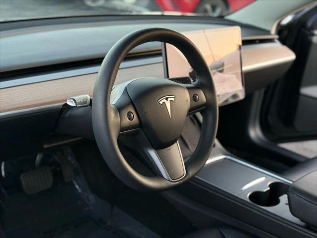 used 2022 Tesla Model 3 car, priced at $19,499