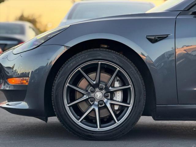 used 2022 Tesla Model 3 car, priced at $19,499
