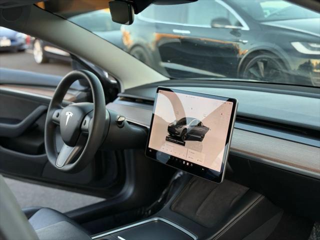 used 2022 Tesla Model 3 car, priced at $19,499