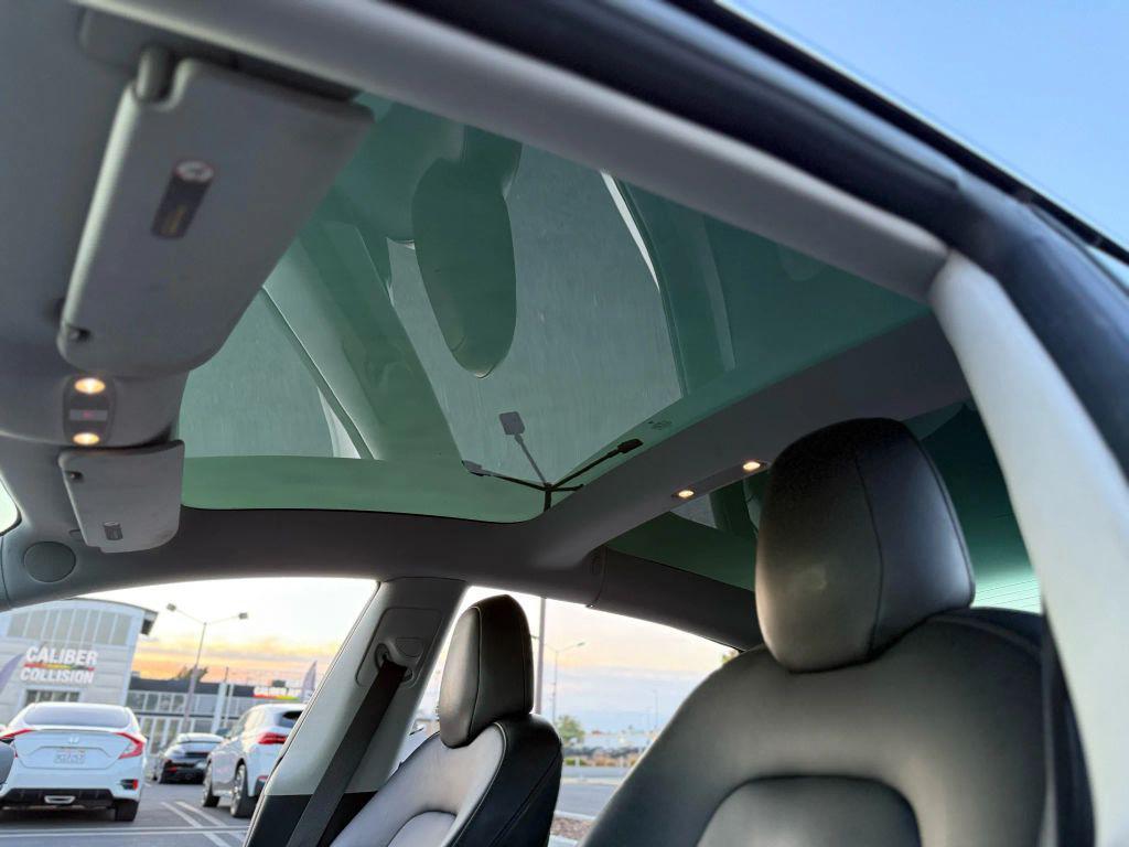 used 2018 Tesla Model 3 car, priced at $14,999