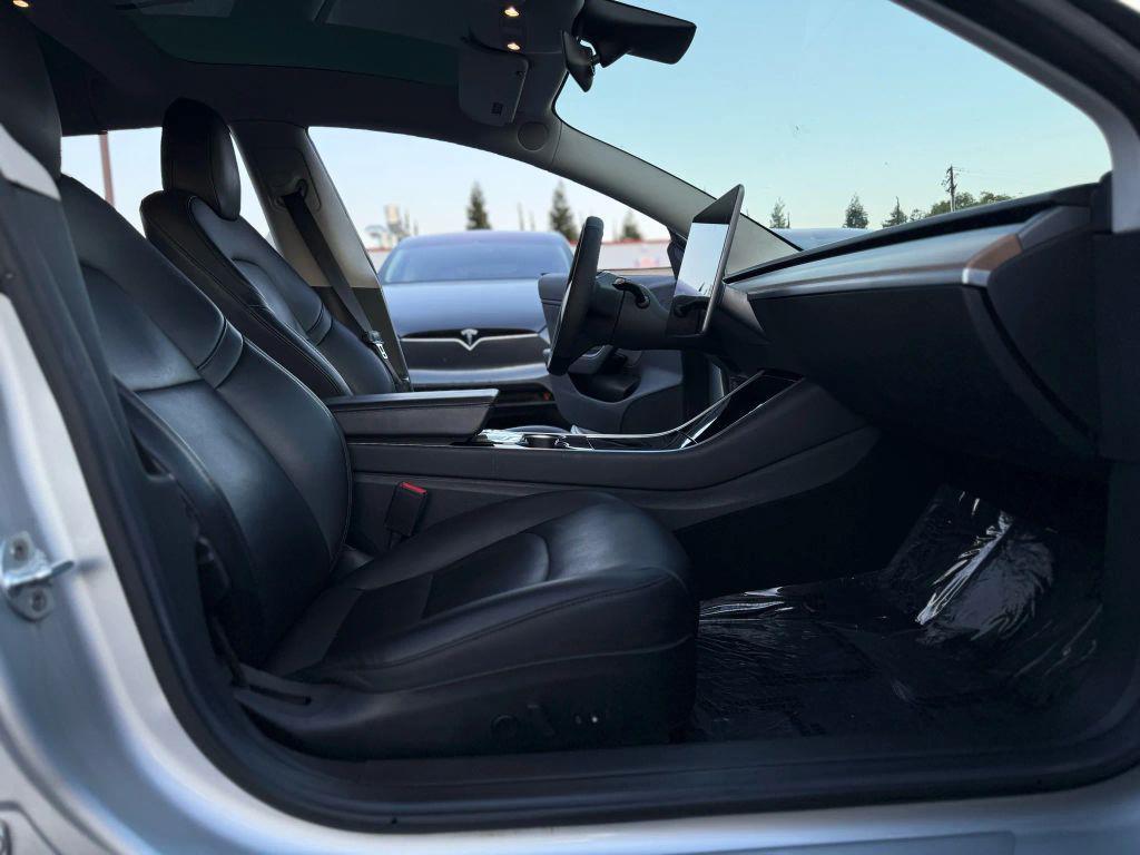 used 2018 Tesla Model 3 car, priced at $14,999