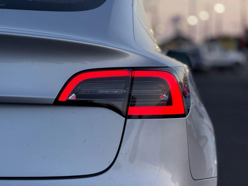 used 2018 Tesla Model 3 car, priced at $14,999