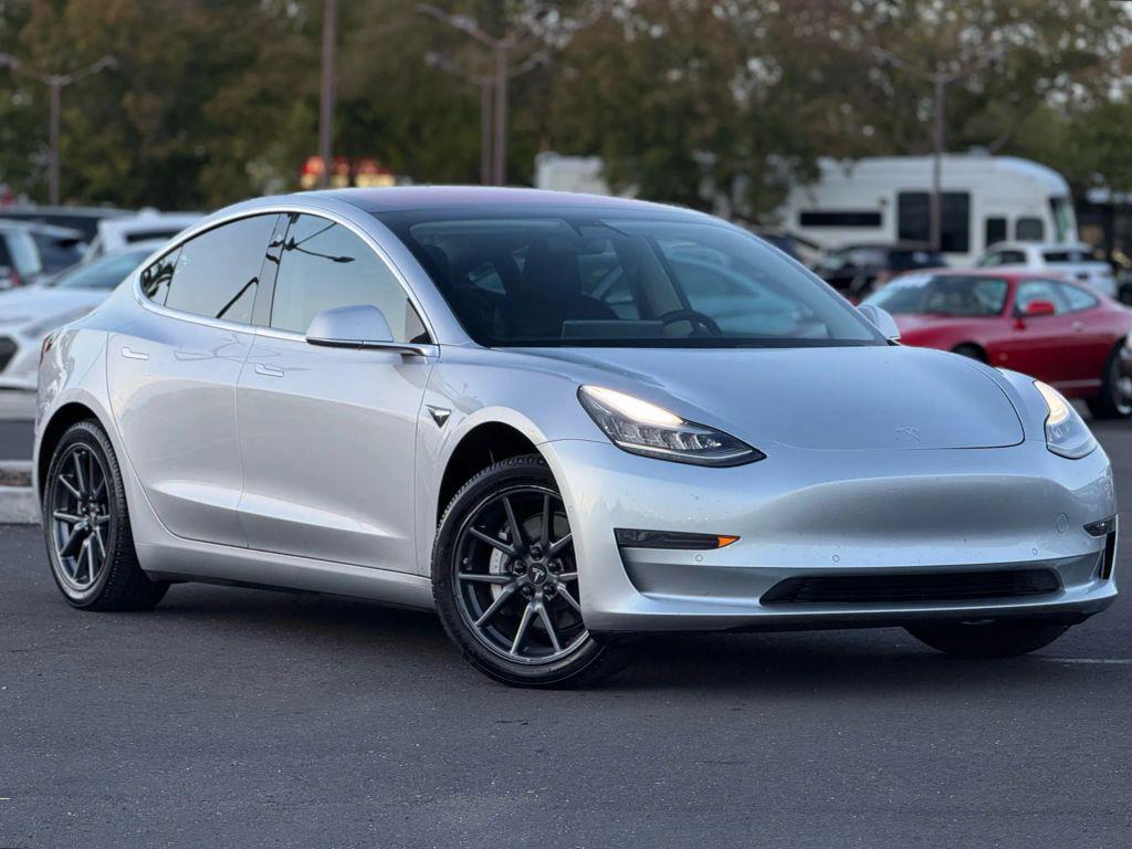 used 2018 Tesla Model 3 car, priced at $14,999