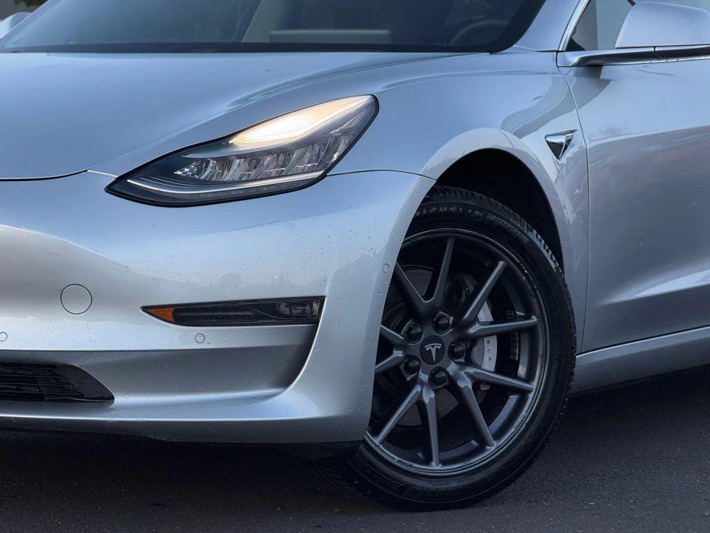 used 2018 Tesla Model 3 car, priced at $14,999