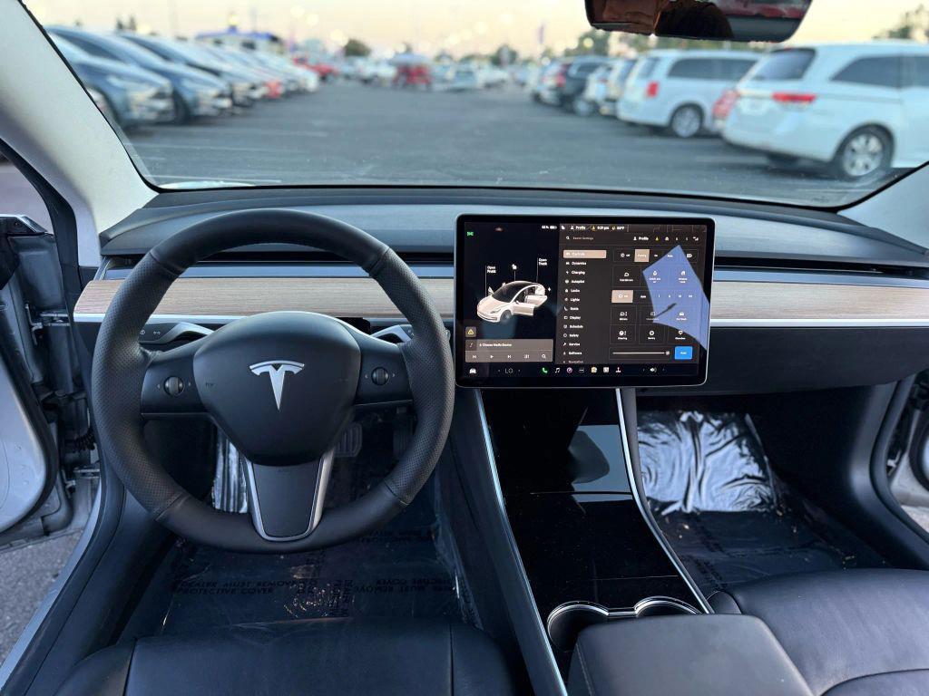 used 2018 Tesla Model 3 car, priced at $14,999