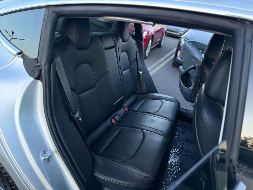 used 2018 Tesla Model 3 car, priced at $14,999