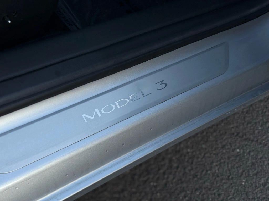 used 2018 Tesla Model 3 car, priced at $14,999