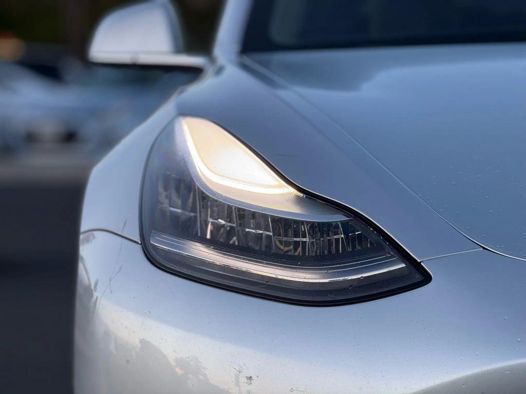 used 2018 Tesla Model 3 car, priced at $14,999