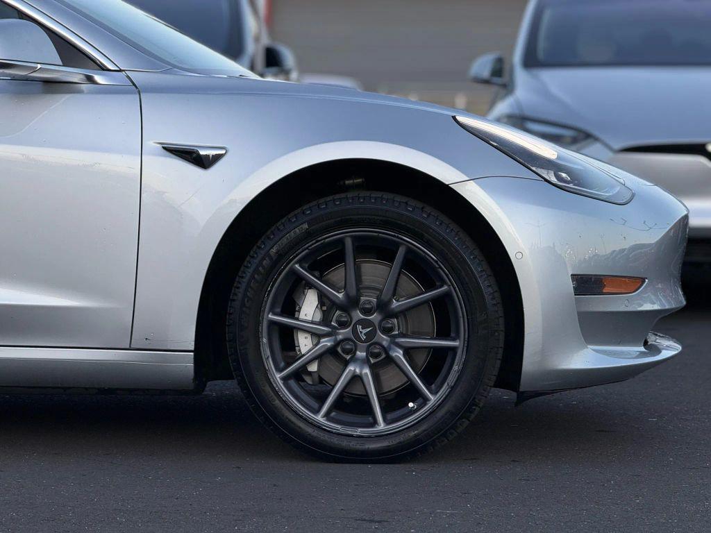 used 2018 Tesla Model 3 car, priced at $14,999