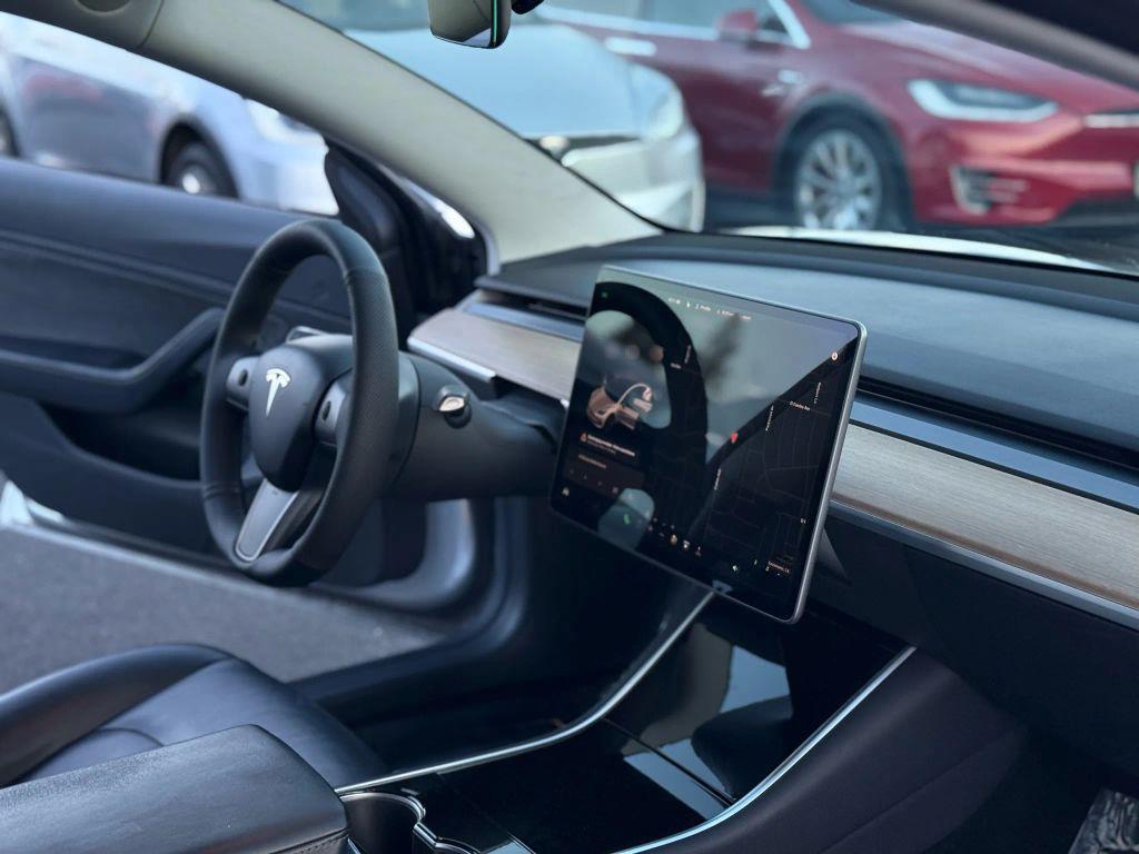 used 2018 Tesla Model 3 car, priced at $14,999