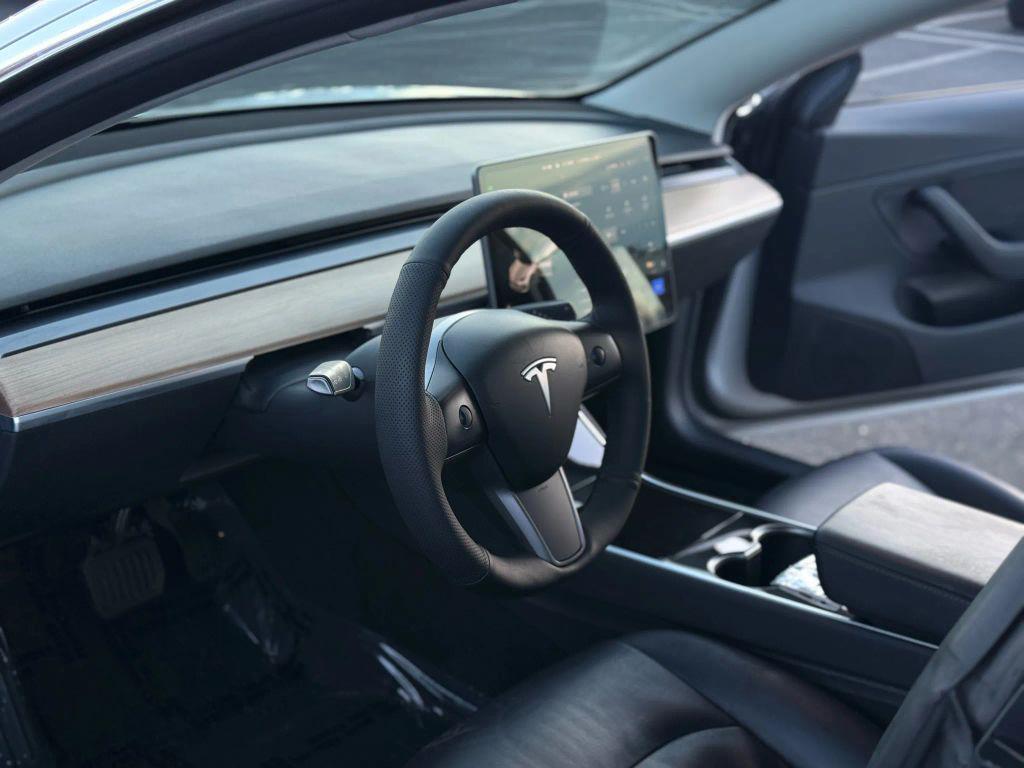 used 2018 Tesla Model 3 car, priced at $14,999