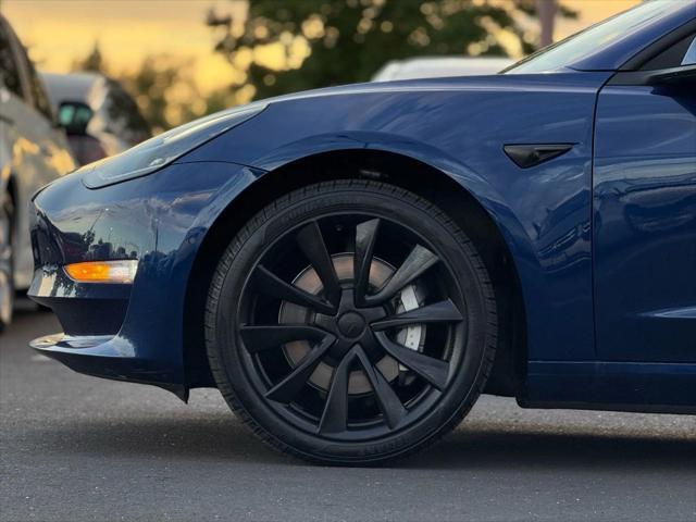 used 2017 Tesla Model 3 car, priced at $14,499