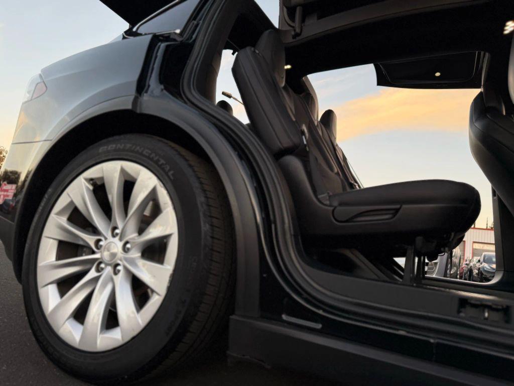 used 2018 Tesla Model X car, priced at $28,999