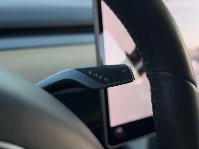 used 2020 Tesla Model 3 car, priced at $16,999