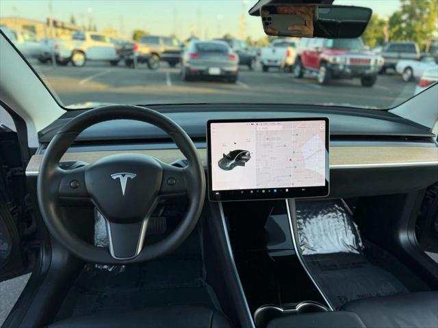 used 2020 Tesla Model 3 car, priced at $16,999
