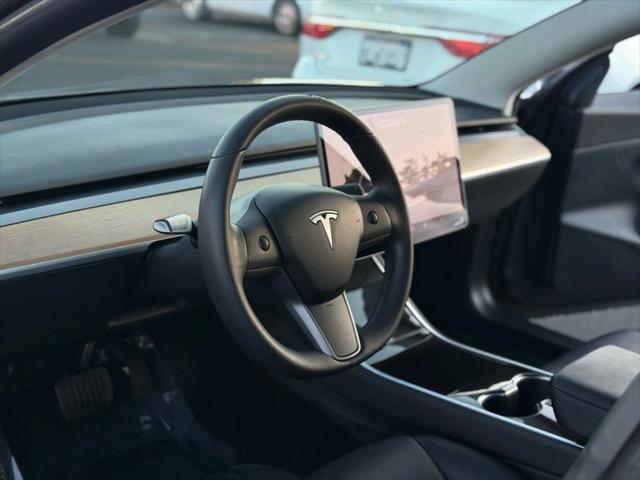 used 2020 Tesla Model 3 car, priced at $16,999