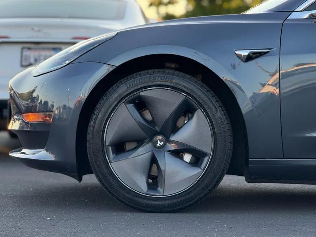 used 2020 Tesla Model 3 car, priced at $16,999