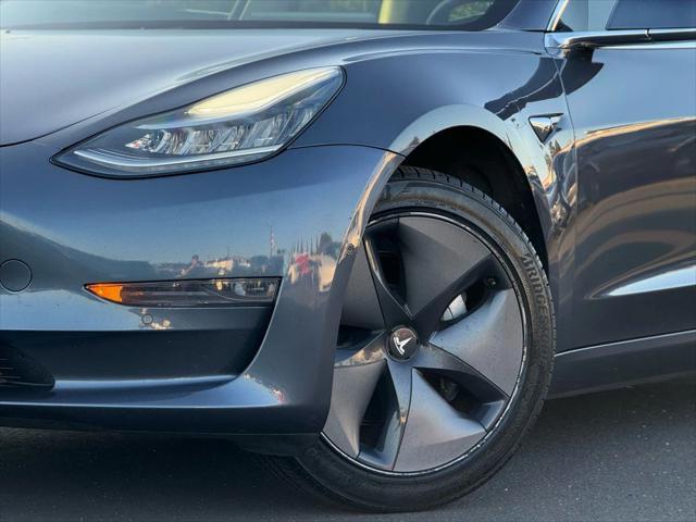 used 2020 Tesla Model 3 car, priced at $16,999
