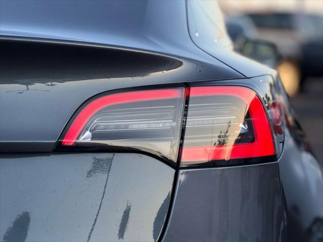 used 2020 Tesla Model 3 car, priced at $16,999