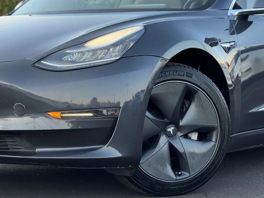 used 2018 Tesla Model 3 car, priced at $14,999
