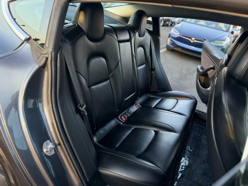 used 2018 Tesla Model 3 car, priced at $14,999