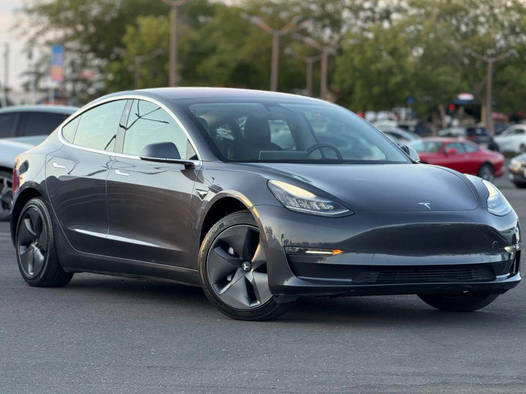 used 2018 Tesla Model 3 car, priced at $14,999