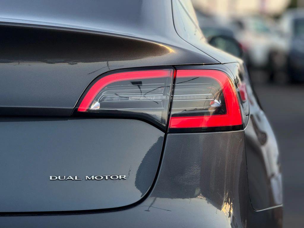 used 2018 Tesla Model 3 car, priced at $14,999