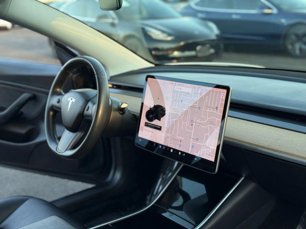 used 2018 Tesla Model 3 car, priced at $14,999