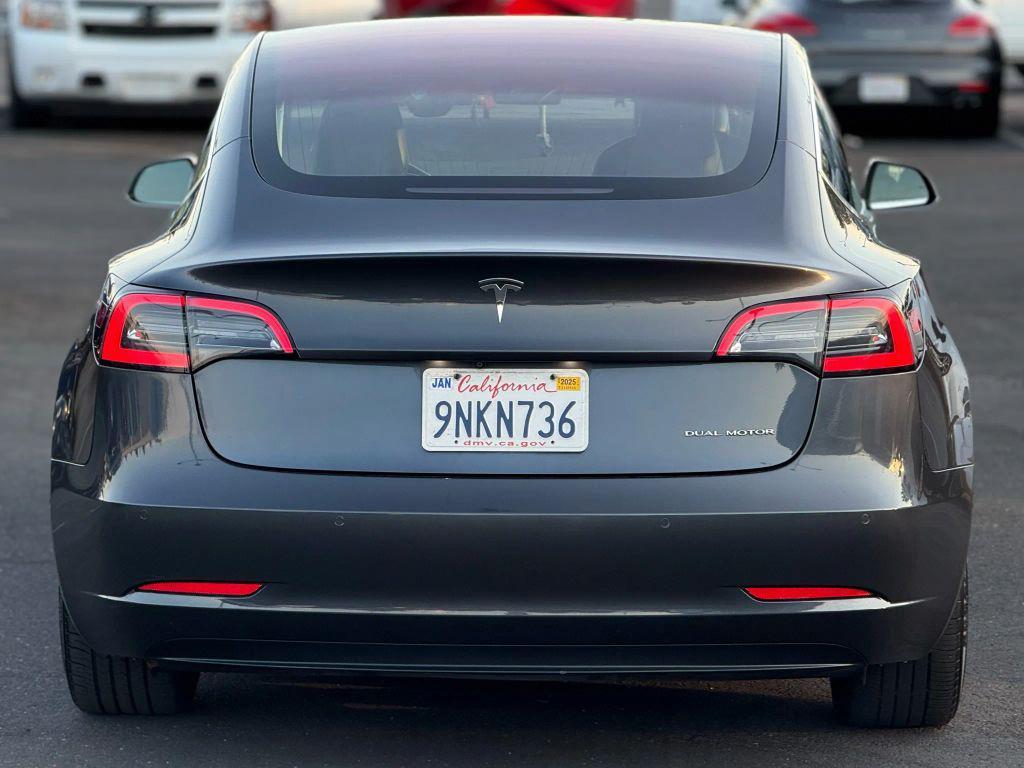 used 2018 Tesla Model 3 car, priced at $14,999