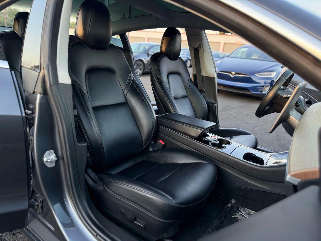 used 2018 Tesla Model 3 car, priced at $14,999