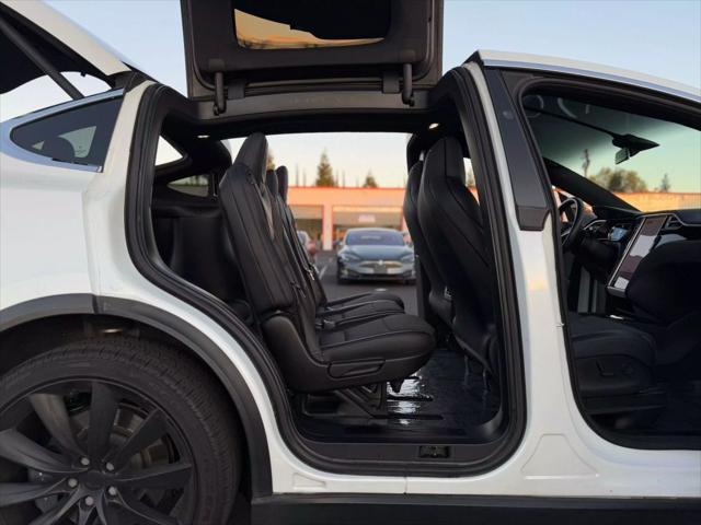 used 2018 Tesla Model X car, priced at $27,999